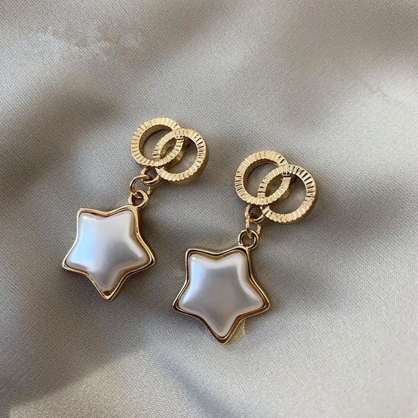 

Star-shaped earrings - elegant double-ring earrings for women, with a sophisticated and high-end look, suitable for office commuting. Korean-style earrings.