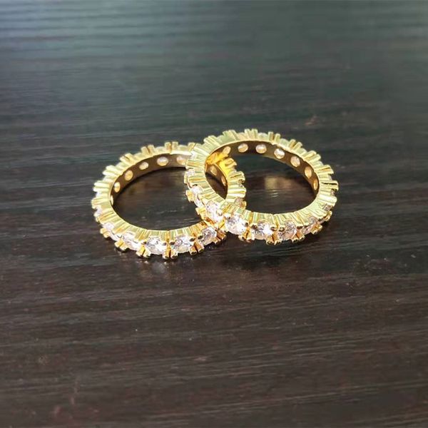 

Luxurious Ladies' Golden Band Adorned with Sparkling Diamonds & Rounded Design