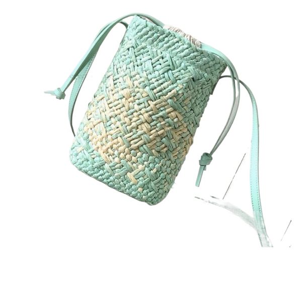 

This handbag with a single shoulder strap, designed by 99A, is made of palm and cowhide materials and is woven together. It is a must-have for summer outfits., One