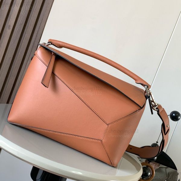 

99A exclusive new version geometric bag for top designers, featuring exquisite hardware and genuine leather, with a single shoulder strap for carrying or carrying., One