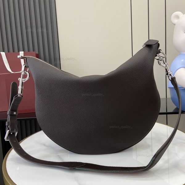 

The creative bags designed by Designer 12A, featuring genuine leather, single shoulder handbag style, and double-button hardware, exude an elegant and fashionable vibe., Two