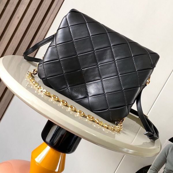 

The designer of 99A has a unique creative touch. This distinctive and high-end crossbody bag with a shoulder strap is crafted from sheepskin material., Three