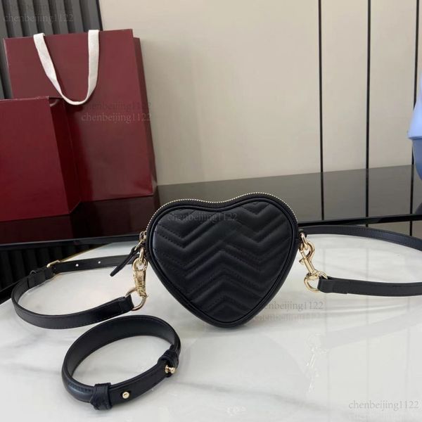 

99A stylish and casual heart-shaped bag of high quality, made of imported sheepskin and featuring top designer design ideas. The bag has a simple and compact shape., One