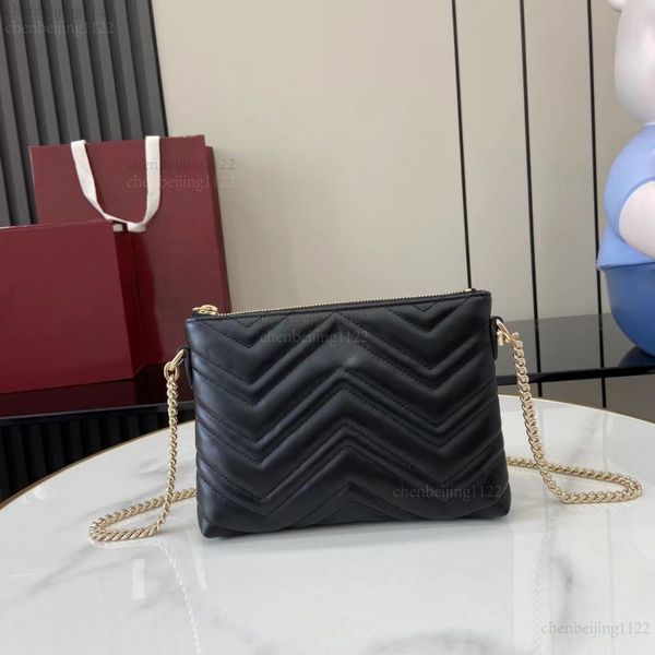 

99A handbag with a shoulder strap is a masterpiece by a top designer. It is made of imported sheepskin and is both fashionable and practical for travel or dates., One