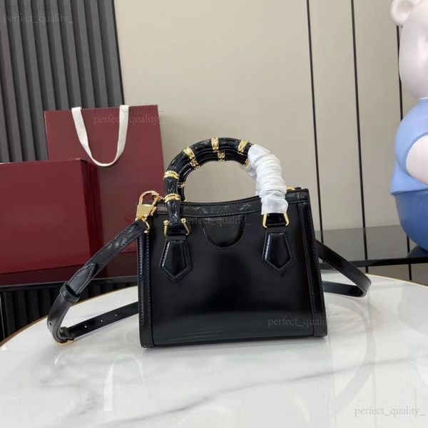 

12A Designer's creative crossbody bag with a single shoulder strap, made of high-quality leather, is the perfect choice for sophisticated fashionistas., Three