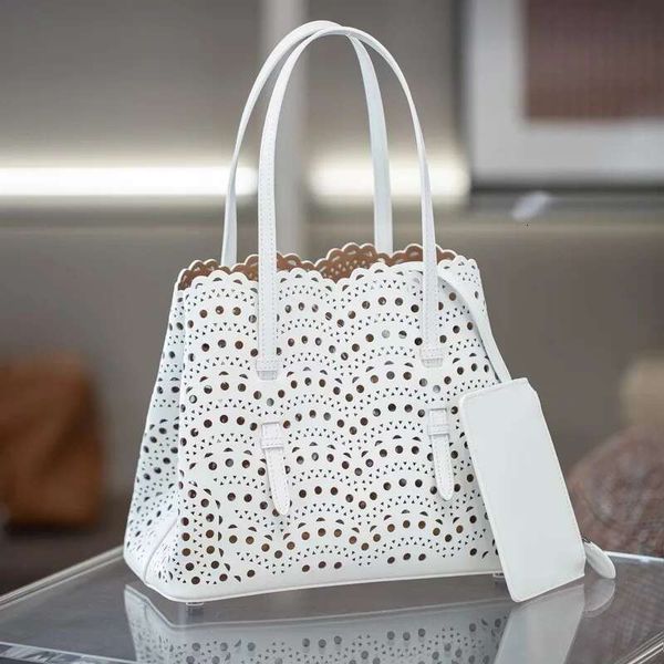 Luxury Hollowed-out Hanbag Design Fashion Large Capacity Genuine Leather Bucket Bag High Quality Cowhide Shoulder Handbags For Women Pink Beach Bag