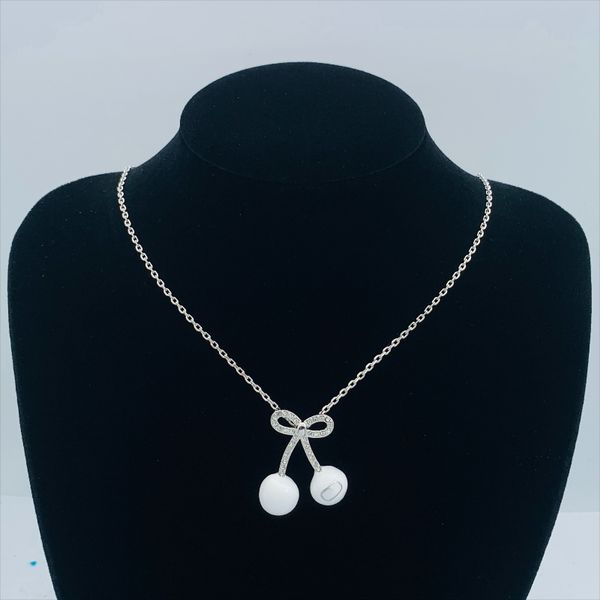

Classic designer cherry pendant necklace 18K gold stainless steel fashion short necklace for ladies perfect for parties and birthdays Unique design