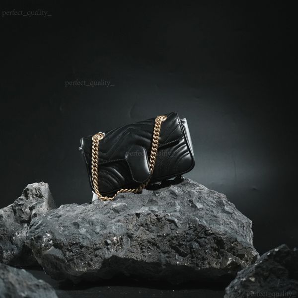 

The handbag with a single shoulder strap and a slanted design, meticulously crafted by 99A designers, embodies a sophisticated style through its leather material., One