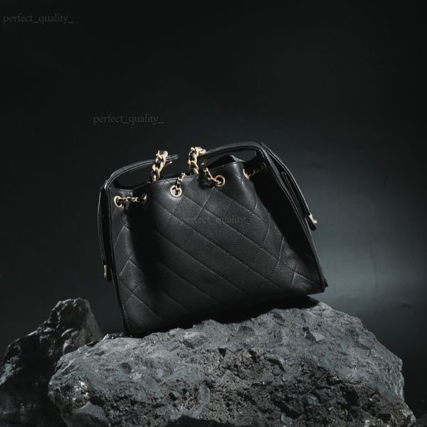 

This 12A designer handbag, designed with great care, is a crossbody bag with a single shoulder strap. Its leather material symbolizes high-end fashion and is durable., One