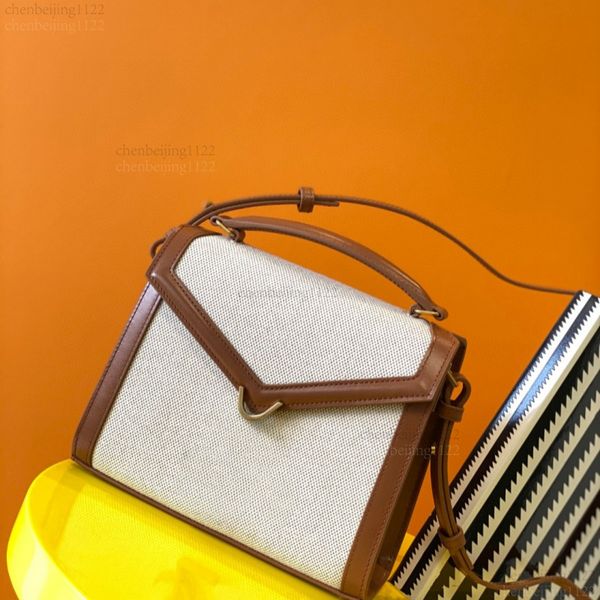 

99A high-end designer handcrafted crossbody bag with a single shoulder strap. The bag is made of canvas with exquisite hardware. It is a 20CM mini handbag., One