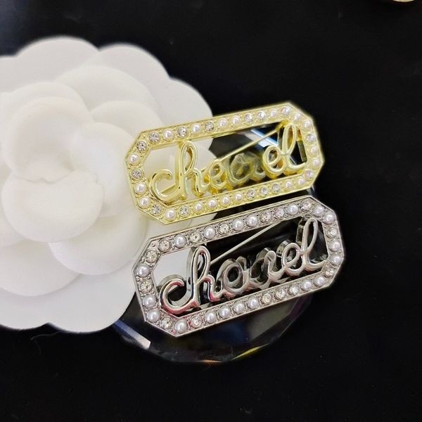 

Brand brooch - Women's and Men's Couple Style - Diamond Brooch - Fashion Jewelry Accessory - Letter Pearl and Crystal Design - Back has a steel stamp mark