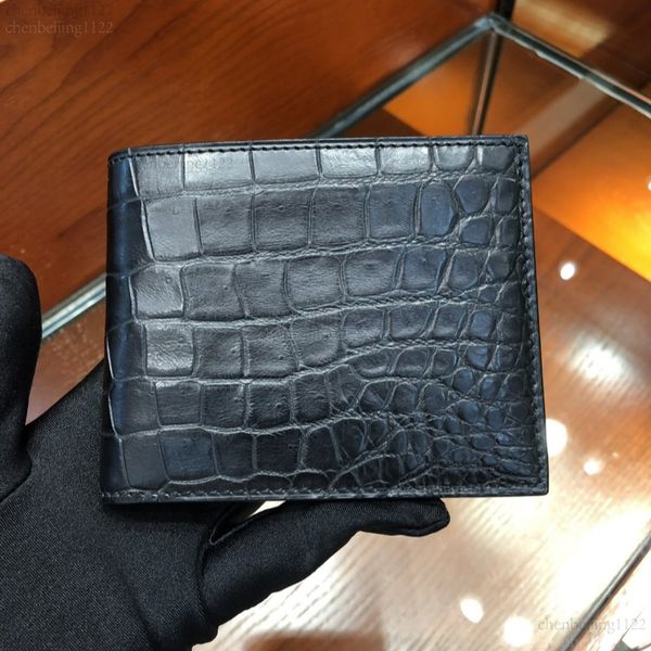 

99A This men's leather wallet is designed by a top designer. It is made of imported crocodile skin and is crafted by hand, giving it a unique texture and feel., Five