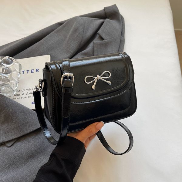 

The new fashionable and high-quality glossy crossbody for women is paired with a small square bag, Black