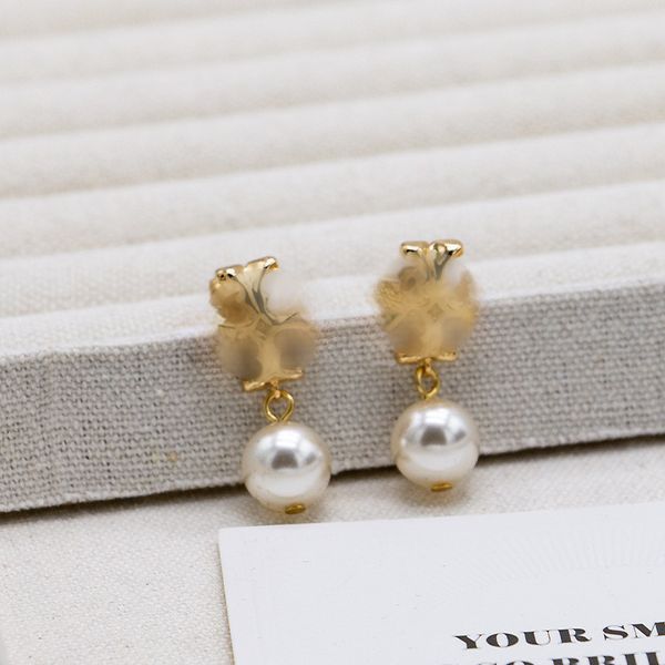 

Designer Pearl Stud Earrings for Women, Gold Plated 18K Gold Perfect for Parties, Weddings, and Jewelry Gifts
