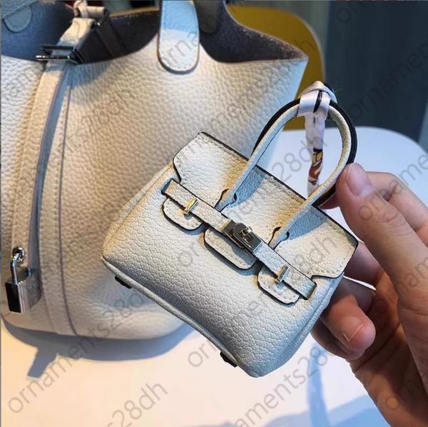 

Coin purses designer luxury coin purse key holder earphone bag Lipstick mini keychain bag Retro bucket mouth red envelope simple pendant cash purse pocket organizer, Brown