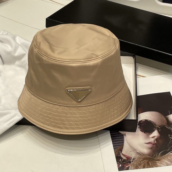 

Designer hats Classic and fashionable closed eye inverted triangular logo black fisherman hat for men and women couple sun protection hat