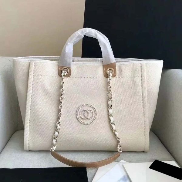 Designer bag fashionable and luxurious tote bag calf leather canvas beach bag sturdy and handbag shoulder bag crossbody bag 001