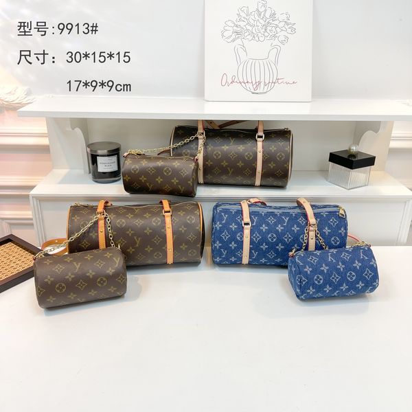 

Fashionable Printed Barrel Handbags Brown monogram blue denim prints Matching small pouches functional for daily must - haves Elevate your fashion game, Light brown