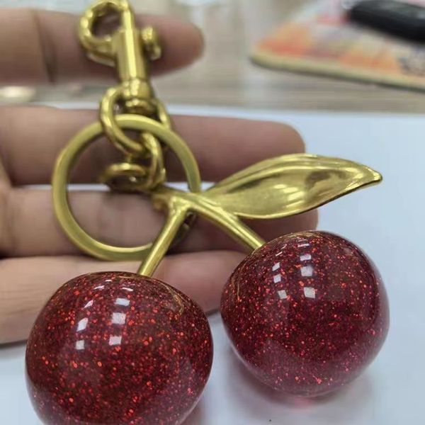 

Other Fashion Accessories Red Pink Cherry Keychain Bag Charm for Women Luxury Key Decorative Pendant Accessory Girls Like Classic Metal Buckle Ring