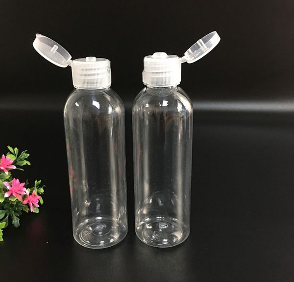 Botella de plástico PET de 60 ml con tapa abatible botella de forma redonda transparente para desmaquillador gel desinfectante de manos desechable