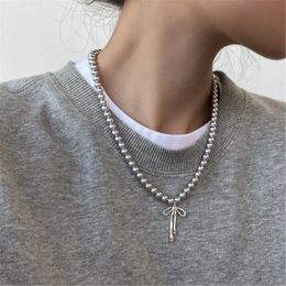 634c couloir à la mode avec pendentif Collier de bowknot gracieux accessoires de bijoux de cou de perles gris 240403