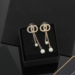 693074 diseñadores de marca de lujo de plata de oro sencillo mixto letras geométricas famosas mujeres redondeadas de cristal redacción de diamantes de boda Pearring Farty de boda Diamante