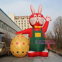 6 m 20 pieds de haut en gros personnalisé lapin de Pâques gonflable lapin décoration d'événement prix usine costume gonflable avec impression de logo gratuite pour la publicité du parc