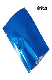 6x9 cm Papel de aluminio azul Paquete de envasado al vacío Bolsas Almacenamiento de alimentos Parte superior abierta Sellable al calor Papel de Mylar Vacío Paquete de sellado térmico de grado alimenticioi9975948
