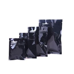7 tailles Sacs d'emballage en papier d'aluminium noir Sacs d'échantillons thermoscellés avec fermeture à glissière refermable Mylar Zip Lock Sac de stockage de qualité alimentaire 100pcs / L Ogxe