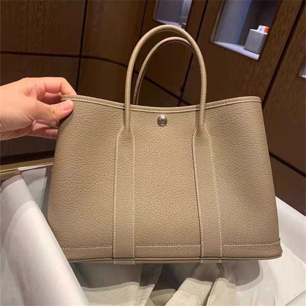 70% Factory Outlet Off Jardin En Cuir Véritable Femmes À La Mode Une Diagonale Straddle Commuter Bandeau Couche De Vachette Casual Sac en solde