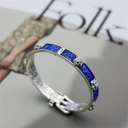 70% de réduction bijoux de créateur bracelet collier anneau Qi personnalité bleu émail tête entrecroisement ceinture couple Bracelet