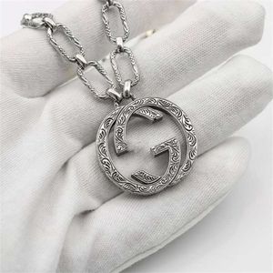 70% korting op designer sieraden armband ketting ring in elkaar grijpende gesneden patroon hangende heren damespaar