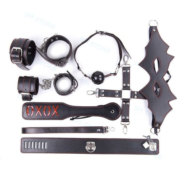 Bondage 7 pièces Harnais Menottes Cheville Poignets Cat Eye Blinder Gag Cross Strap Paddle Kit AU653