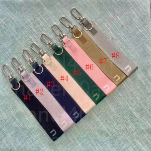 Porte-clés de yoga lu 8 couleurs, décoration suspendue pour sac, chaîne de poignet avec sangle pour clés