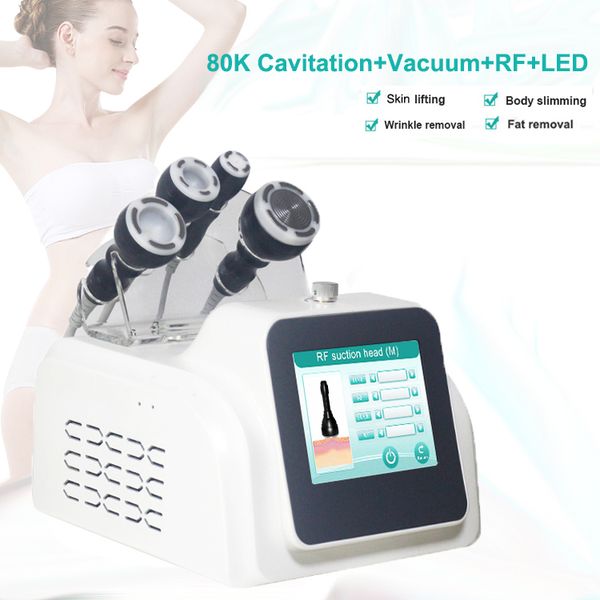 Dispositifs d'amincissement sous vide de cavitation équipement rf radiofréquence tripolaire resserrement de la peau machine de beauté liposuccion ultrasonique 4 poignées