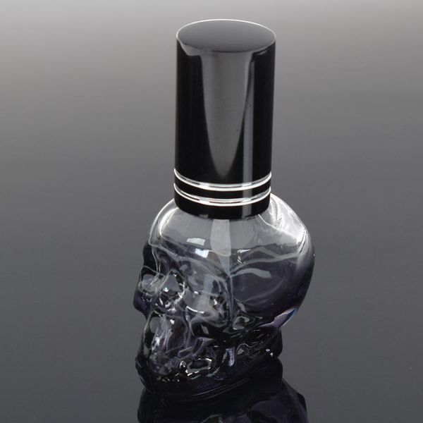 Botella de Perfume de vidrio vacía portátil recargable con forma de calavera con personalidad de 8ml, Mini prensa de viaje, botellas de Perfume en aerosol