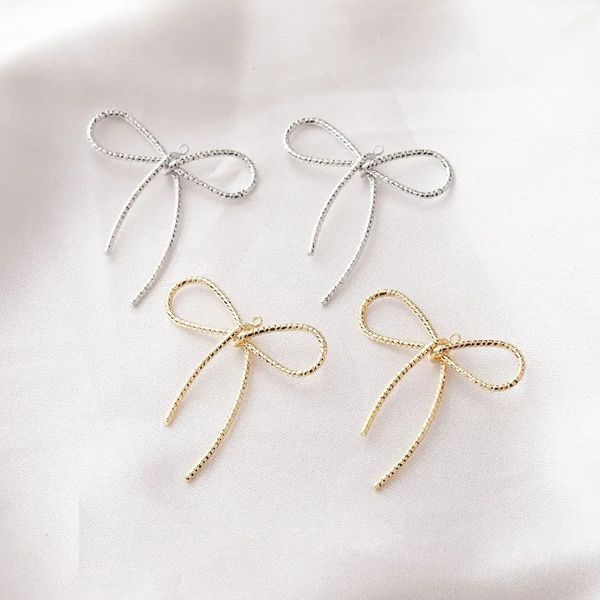 8pcs Encantos colgantes de arco para joyas que hacen aretes de bricolaje de bricolaje a mano hallazgos de oro de 14k chapados en oro 30*33 240429