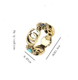 Anelli a fascia con lettere placcate in oro 18 carati per le donne degli uomini Stilista di marca Lettere Gioielli con anello in metallo con cristallo turchese