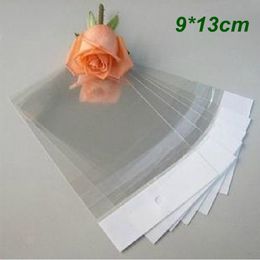 9 * 13cm Sac d'emballage en plastique transparent auto-adhésif Pochettes en poly-sac Opp Sacs d'emballage cadeau au détail pour bijoux Ornements Perle avec trou de suspension