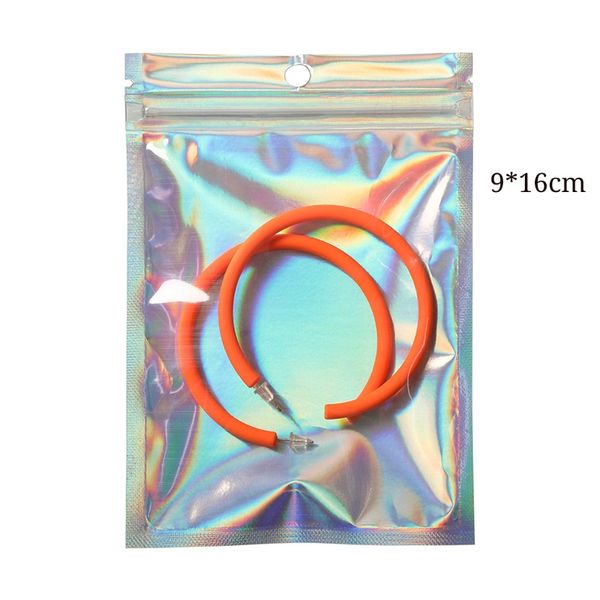 9 * 16 cm Color Arco iris Holográfico Accesorios para teléfonos Bolsas de embalaje Transparente en el frente Almacenamiento de regalos Bolsas de papel de Mylar Geocery y decoración Bolsa de embalaje 100pcs