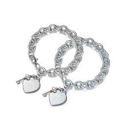 925 Retour en argent sterling au bracelet pour les femmes Classic Key Plus coeur Chaîne de charme Classe de homard Design Light Luxury Jewelry G220238O