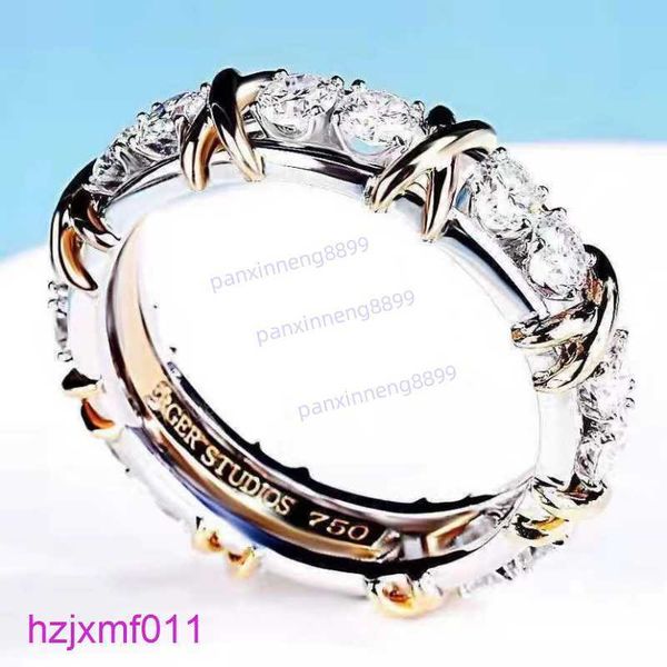 9m6e Band anneaux Designer en forme de titane en titane en acier argenté Love Cross entre les diamants et les femmes en or rose bijourie couple cadeau