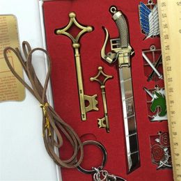 9pcs Définir l'attaque d'anime sur le badge Titan Keychain Bronze Alliage Pendent Chain Shingeki No Kyojin Action accessoires Kids Gifts1962