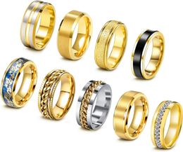 9-delige titanium bandringen voor mannen en vrouwen Cool Fidget draaiende kettingring Angstverlichting Mode Eenvoudige bruiloft Verloving Zwarte ring Flesopenerset