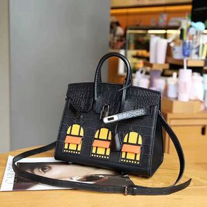 Un modèle de sac de luxe Bojin 2023 Couche de tête en peau de crocodile en cuir de vachette petite maison couleur de mode poche diagonale Straddle VIVY pour femmes