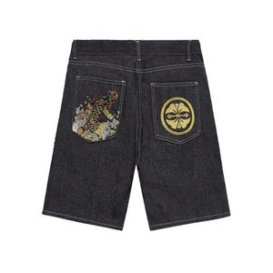 Une collection de shorts en jean Fushen de la marque tendance d'été 2023 avec un design court pour hommes et femmes