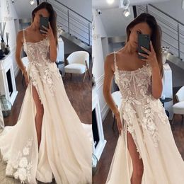 Een jurk spaghetti -lijn vintage trouwjurken bruidsjurken kanten appliques tule parels gesplitste ontwerper mode mariage es ppliques