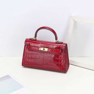 Een Kaily Luxury Bag Lakleer tas van de tweede generatie alligator mini schouder messenger mode textuur schattige handtas EC39