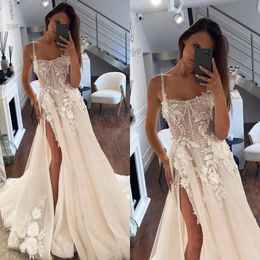 Une ligne Vintage Robe Spaghetti Robes de mariée robes de mariée Appliques en dentelle de tulle perles divisé le designer Robe Mariage es PPLIQUES