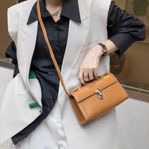 Een niche Savette handtas gemaakt van echt leer, met een kleine vierkante tas, een schoudertas van rundleer met enkele schouder, een handtas met een high-end gevoel